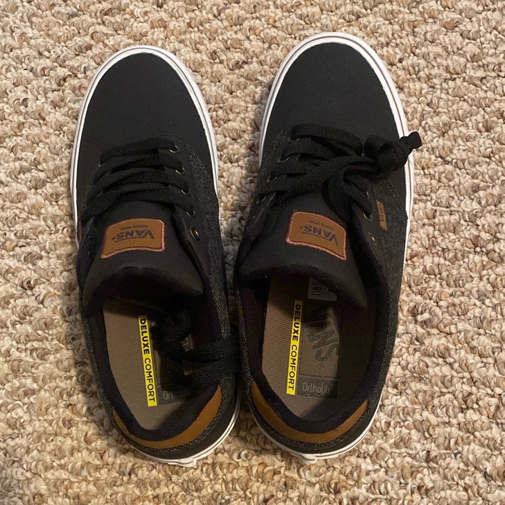 Never worn brand new men’s “Vans” sneakers size 9